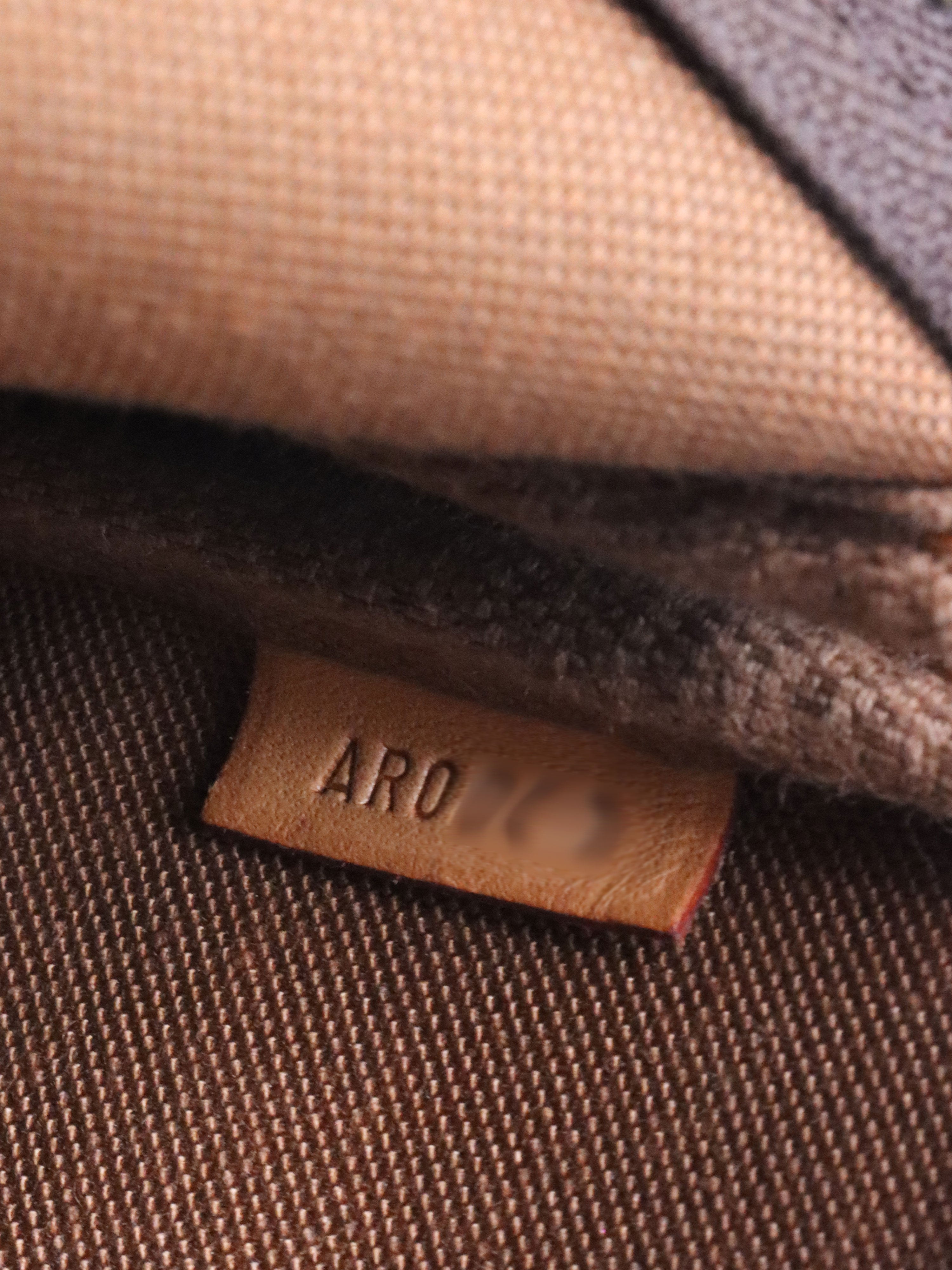 Louis Vuitton Graffiti Pochette Accessories.