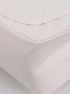 Chanel Small White Chevron 2.55 Bag.