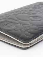 Chanel Black Camellia Wallet.