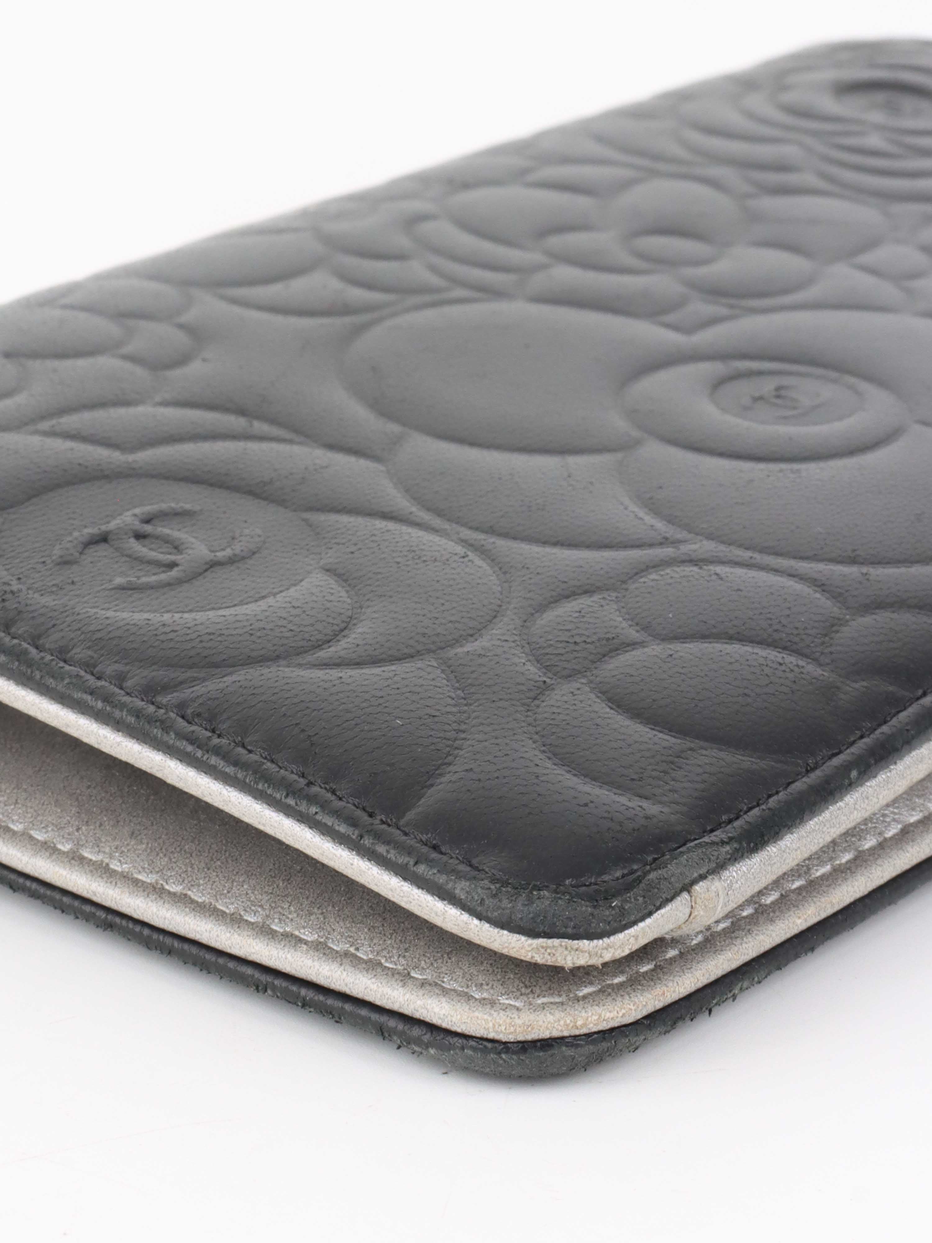 Chanel Black Camellia Wallet.