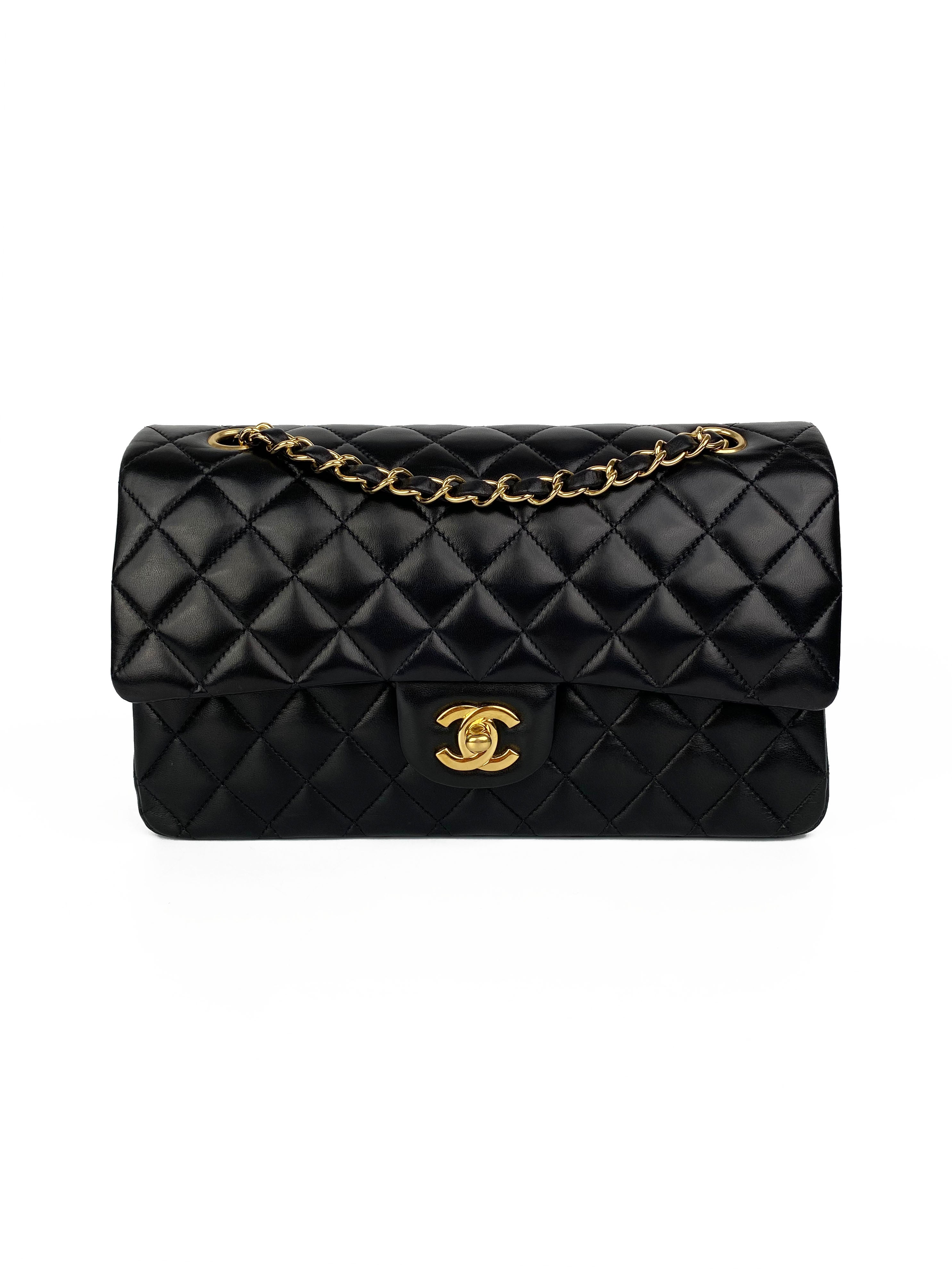 Chanelblackjumboormaxilambskinclassicflap-2.jpg