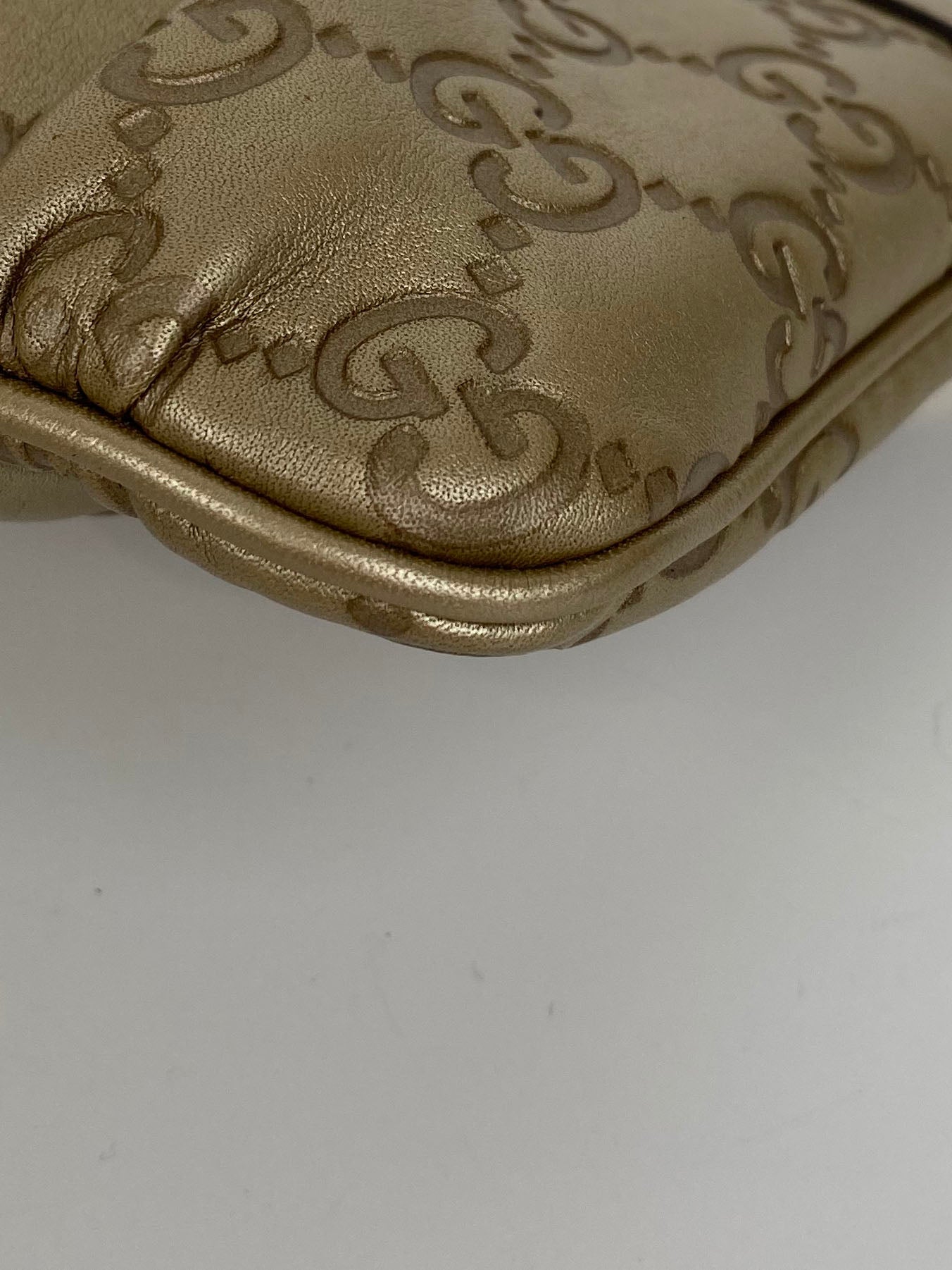 Gucci Gold Guccissima Britt Clutch